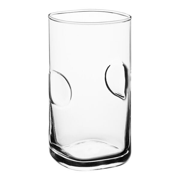An Acopa highball glass with a circular design on it.