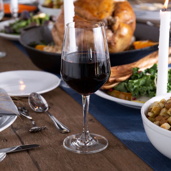 Cabernet sauvignon glass filled with cabernet sauvignon on an elegant table