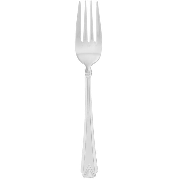 A silver Walco Athenian salad fork with a white handle.