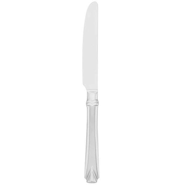 A Walco Athenian stainless steel table knife with a silver handle.