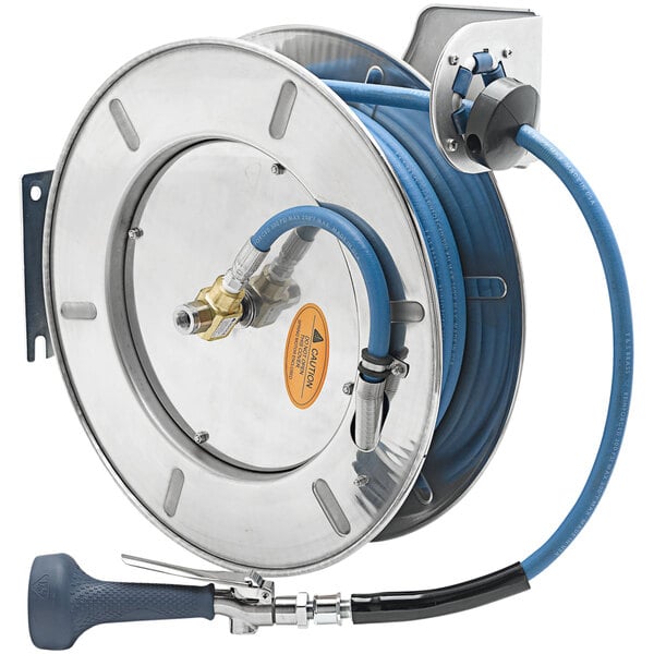 A T&S stainless steel hose reel with a hose attached.