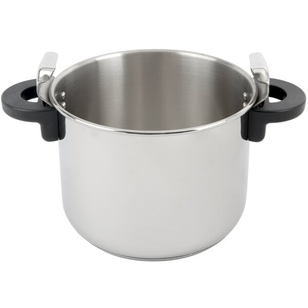 A silver stainless steel Monix pressure cooker with black handles.