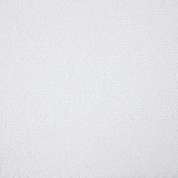 A white surface with small lines on it.