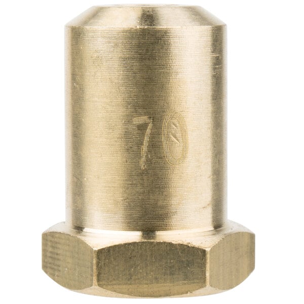 A close-up of a brass #70 Hood Orifice with a hexagonal shape.