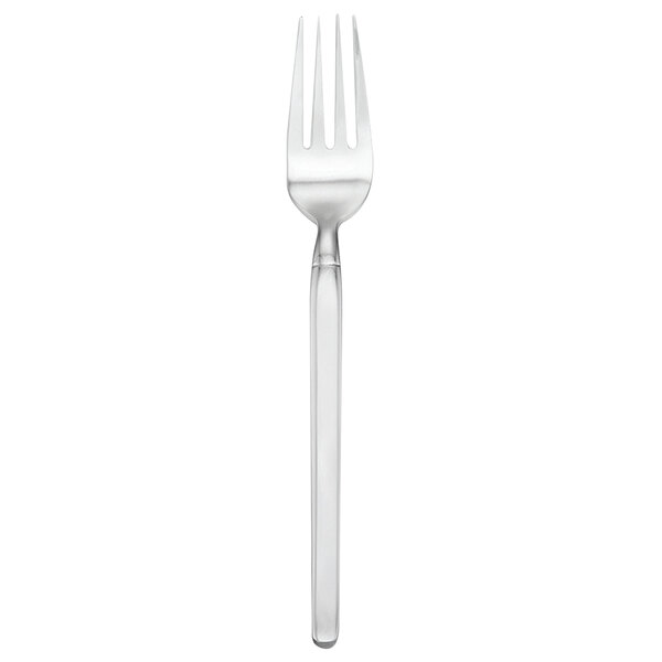 A silver Walco European table fork with a long handle.