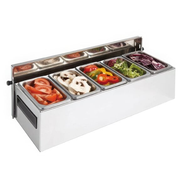 A Matfer Bourgeat stainless steel condiment bar with 5 compartments of food.