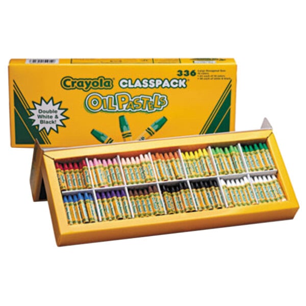 A yellow box of Crayola oil pastels on a shelf.