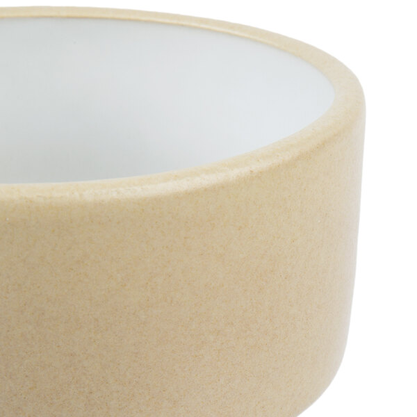 A close-up of a white Chef & Sommelier Geode stoneware bowl.