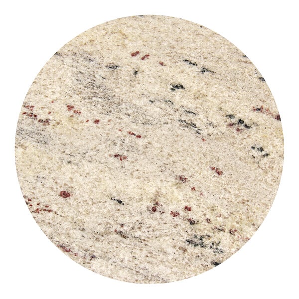 A close up of a Art Marble Furniture round Kashmir White granite table top with red and black spots.