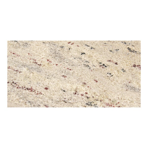 A close-up of a white and red granite Art Marble Furniture table top.