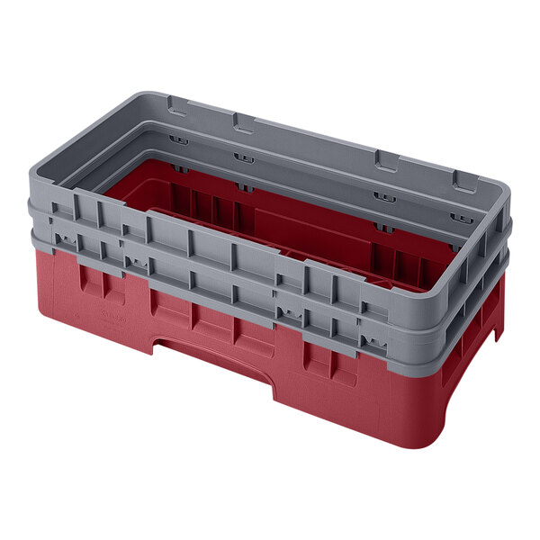 A cranberry and gray plastic half-size open base rack with two extenders.
