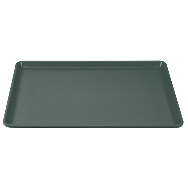 A close-up of a slate blue Cambro dietary tray with a dark gray bottom.