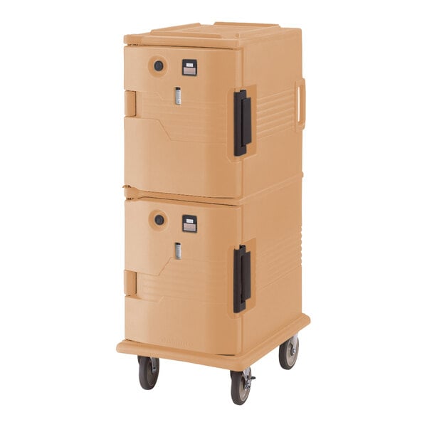 A tan Cambro Ultra Camcart on wheels with a large plastic container inside.