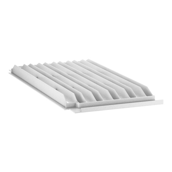 A white plastic grid with holes and strips.