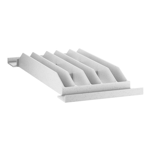 A white plastic vented middle plate with six rows of white squares.