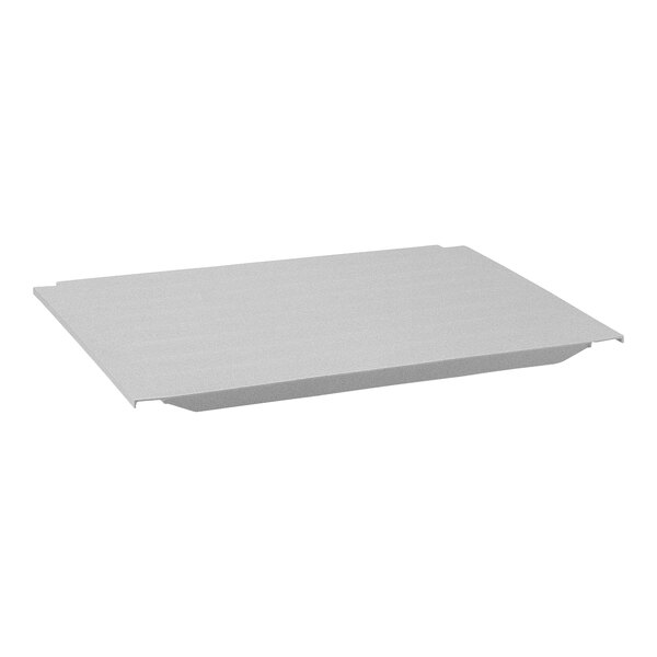 A white rectangular shelf end plate for Cambro Camshelving®.