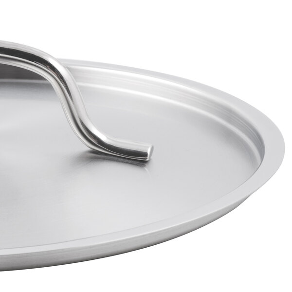 A close-up of the stainless steel lid's silver handle.