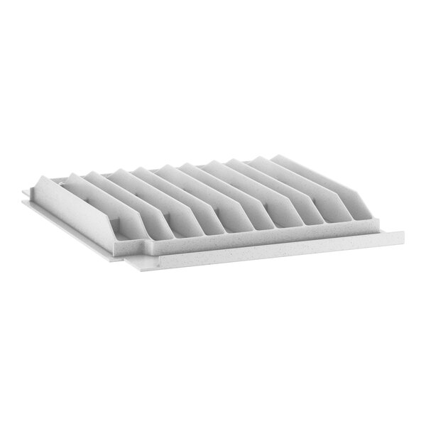 A white plastic shelf end plate with a row of holes.