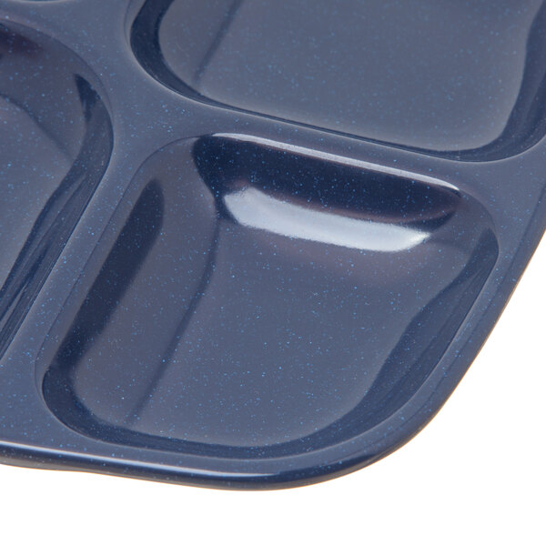 A blue tray with four compartments.