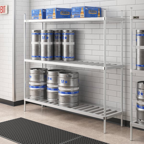 A Regency metal keg rack with several beer kegs on shelves.