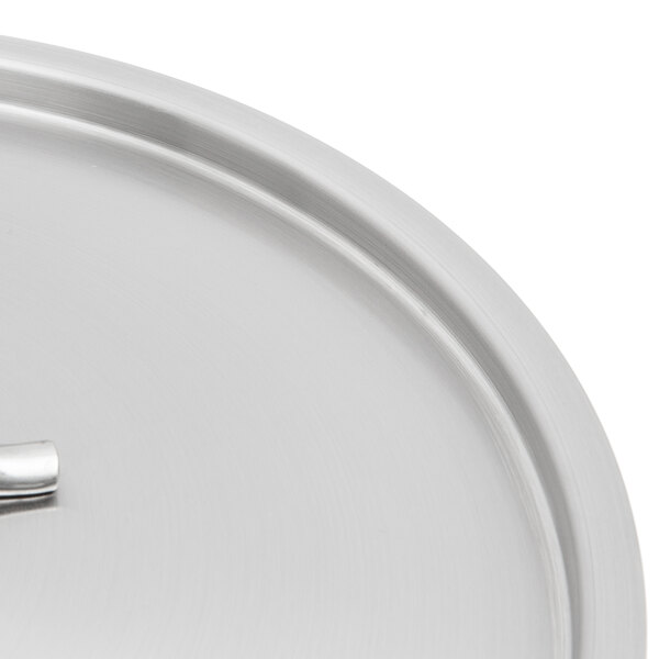 A Vigor stainless steel lid with a handle.