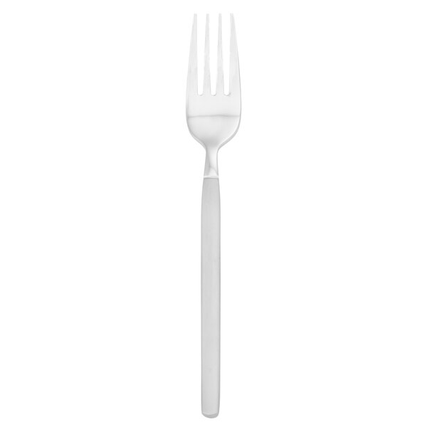 A close-up of a Walco stainless steel salad fork with a white handle.