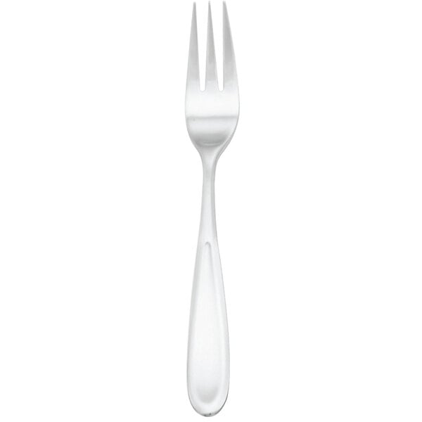 A close-up of a Walco Modernaire dinner fork with a white handle.