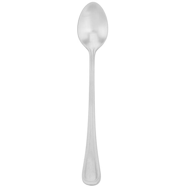 A silver Walco iced tea spoon with a white handle.