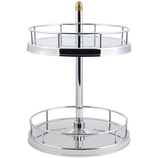 A silver metal Bon Chef revolving stand with a round glass bottom.