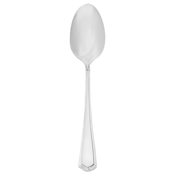 A Walco silver dessert spoon with a long handle.