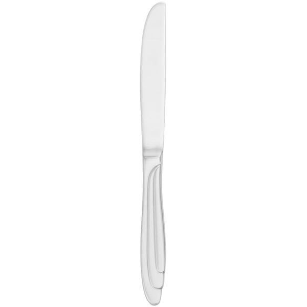 A Walco stainless steel butter knife with a solid handle.