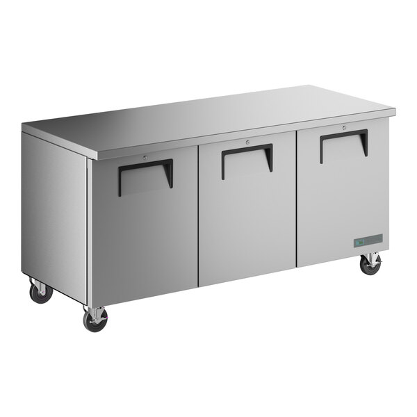 A True TUC-72-HC stainless steel undercounter refrigerator with black handles.
