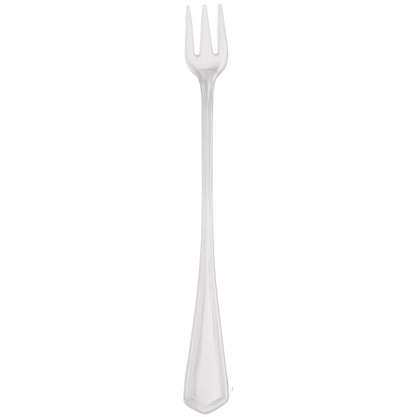 A silver Walco Classic cocktail fork with a white handle.