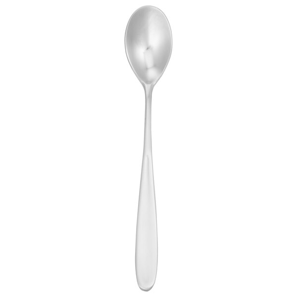 A silver spoon with a white handle.