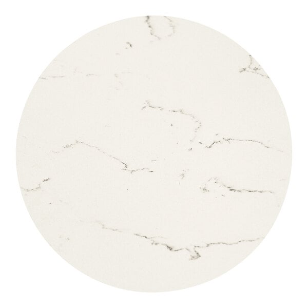 An Art Marble Furniture white quartz table top with black veins in a circular shape.