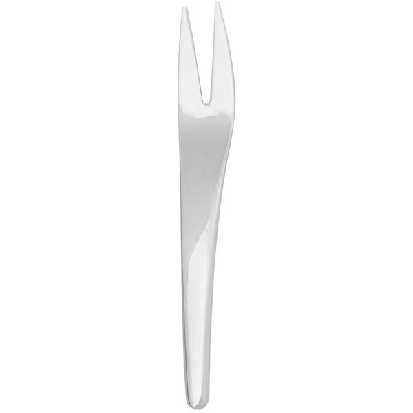 A silver Walco Joreen cocktail fork with a white background.