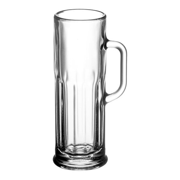 A clear glass mug with a handle.
