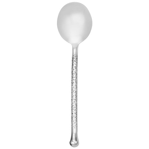 A Walco stainless steel bouillon spoon with a hammered handle.