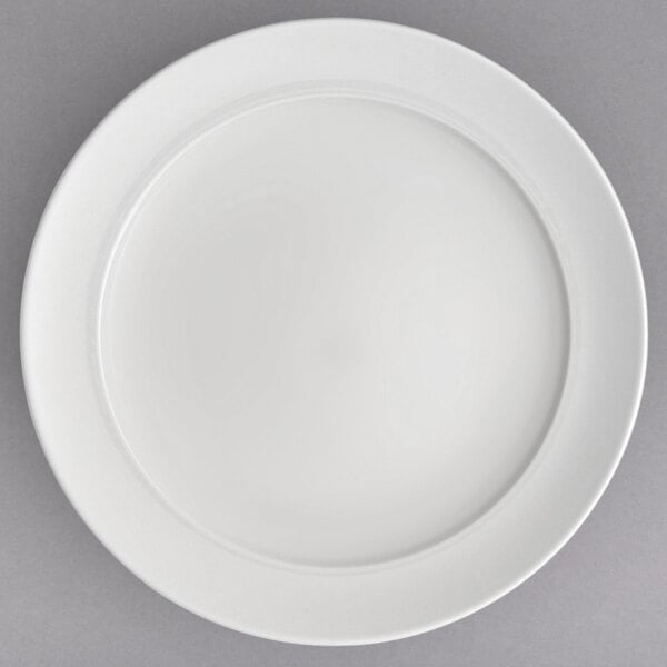 A white Villeroy & Boch bone porcelain round platter with a white rim.