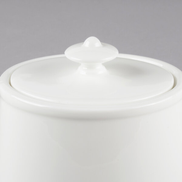 A white Villeroy & Boch bone porcelain teapot with a lid.