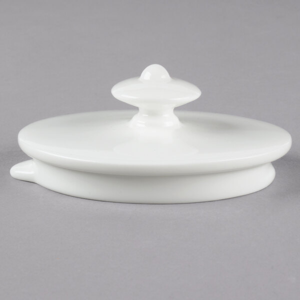 The white porcelain lid for a Villeroy & Boch Stella Hotel teapot.