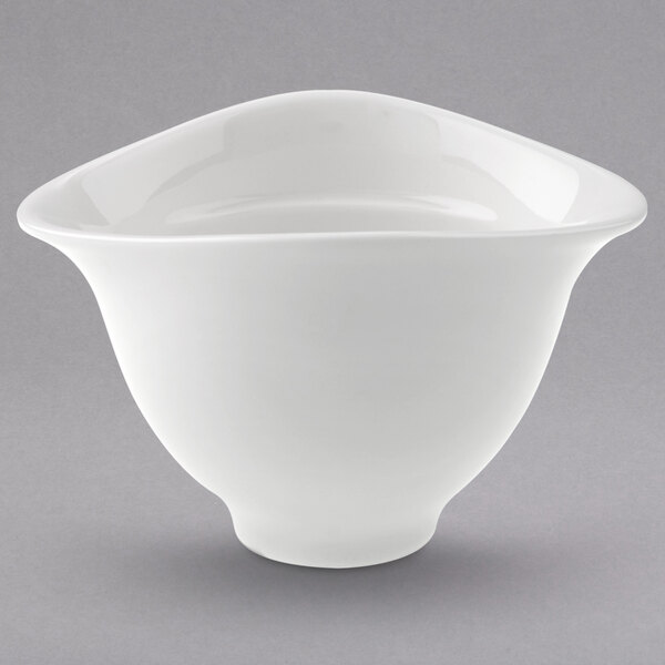 A white bowl with a curved edge.