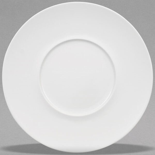 A Villeroy & Boch white bone porcelain flat plate with a round edge and a round center.