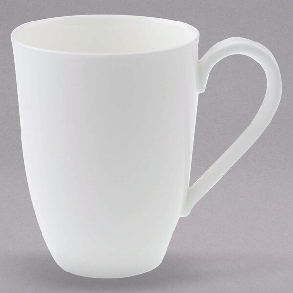 A Villeroy & Boch white bone porcelain mug with a handle.