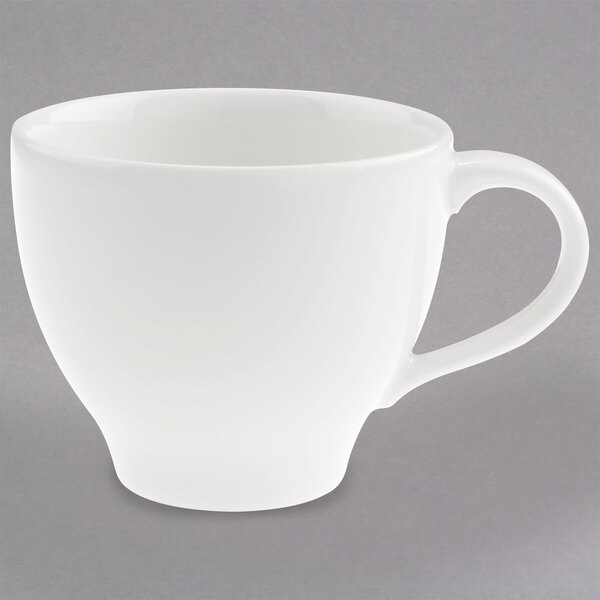 A Villeroy & Boch white porcelain cup with a handle.