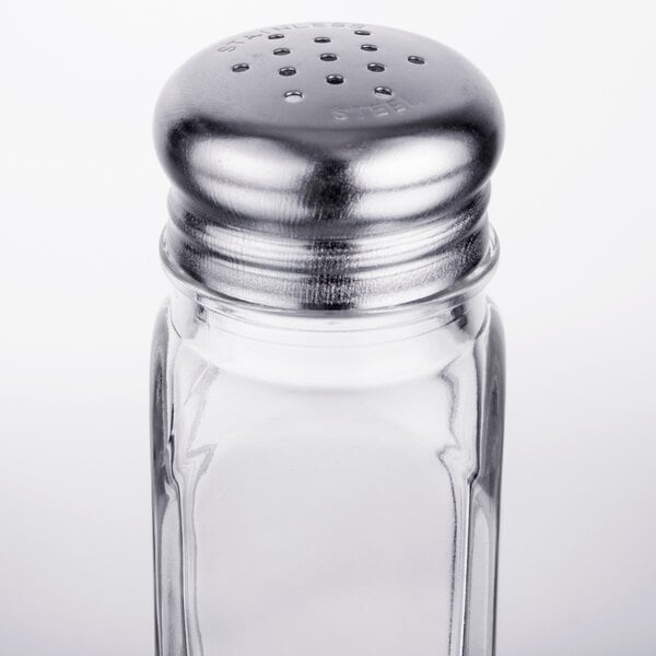 A TableCraft square salt shaker with a silver top.
