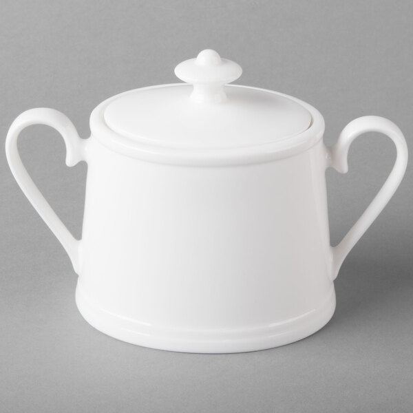 A Villeroy & Boch white bone porcelain sugar bowl with a lid.