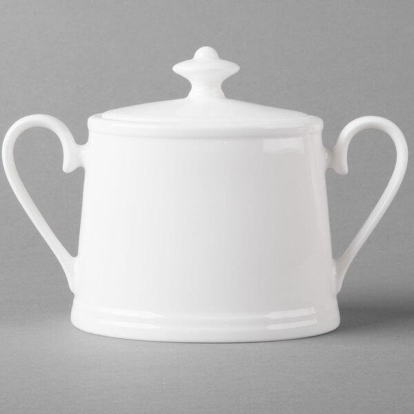 A Villeroy & Boch white bone porcelain sugar bowl with a cover.