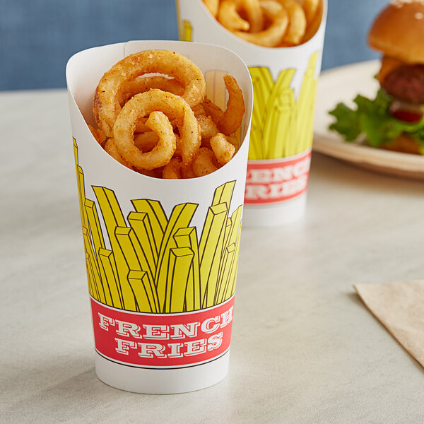 A container of Choice paper scoop cups with a fry design filled with french fries.