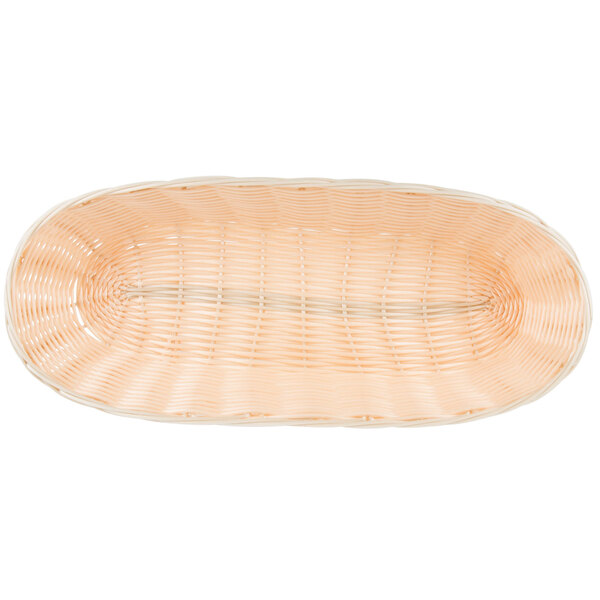 A white woven rattan-like oblong bread basket with a handle.